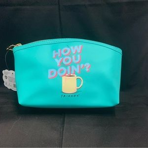 Friends Zippered PVC Round Top Makeup Clutch,Cyan